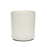 This image shows a cylindrical opaque glass candle container in a matte white color.