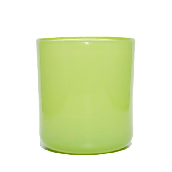 This image shows a cylindrical translucent glass candle container in a bright yellow green color.