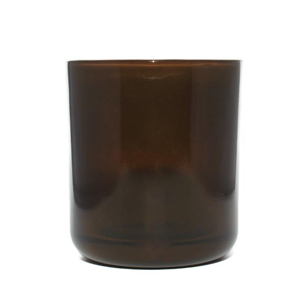 This image shows a cylindrical opaque glass candle container in a dark brown color.